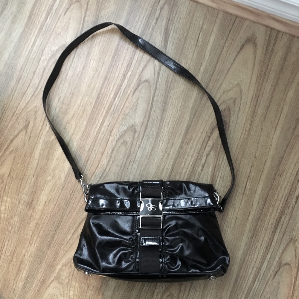 Jessica Simpson small black clutch with strap